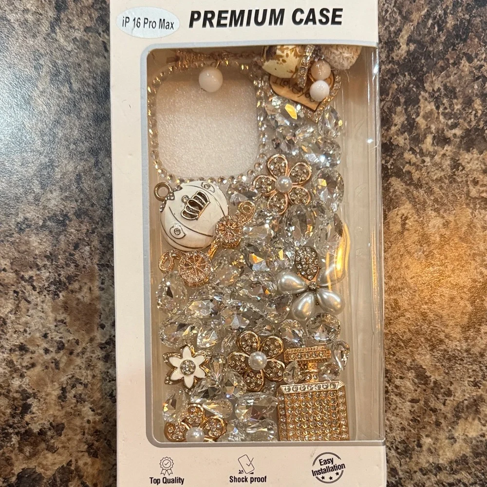 #94 Red and Blue IPhone 16 Pro Max and a Bling out 16 Pro Max Cover.